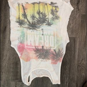 Adorable white tank top with sunset.